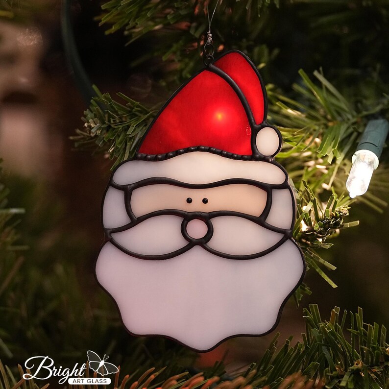 Christmas Tree Ornament Handmade Stained Glass Santa Holiday Suncatcher Window Display Festive Home Styling Copper Foil Technique Red White Glass Design Hand Soldered Artisan Craft Seasonal Gift Collection Winter Holiday Window Hanging