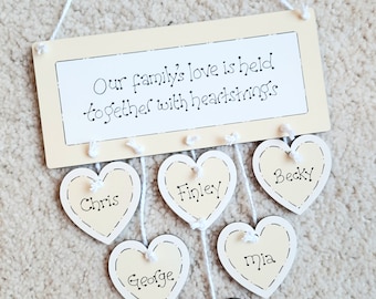 Family home sign with hanging personalised hearts