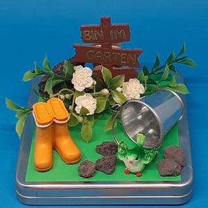 Geldgeschenk Garten Baumarkt Blumen Pflanzen Gummistiefel Metalleimer Gutschein Geschenkbox Geschenkidee originell besonders