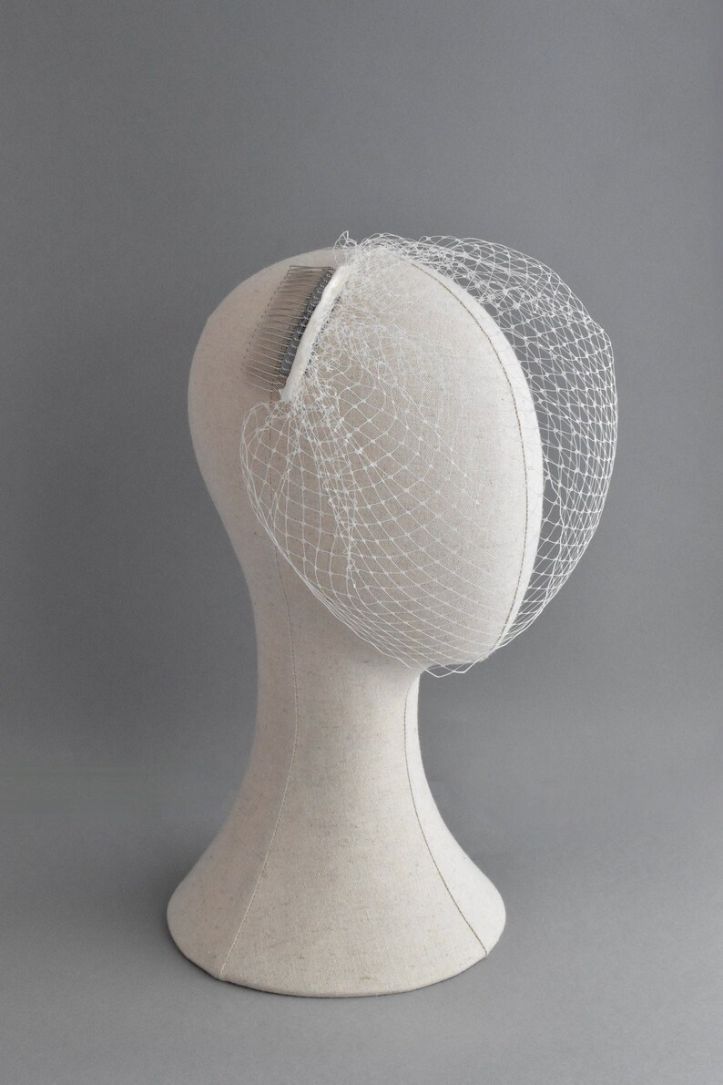 Ivory Birdcage Veil on selling a Silver Plated Comb