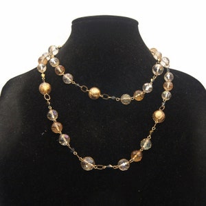 Vintage Gold Tone with Shades of Gold Beads 18 Inch 2 Strand Necklace with Lobster Claw Clasp.