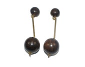 Long Gold Tone and Wood Balls Dangle Clip on Vintage Earrings.