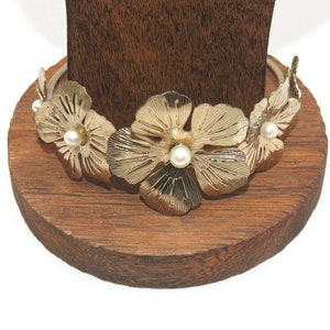 Vintage Gold Tone and Faux Pearl 8 Inch Floral Design Bangle Bracelet.