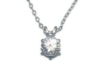 Vintage Silver Tone and Clear Crystal Pendant on 18 Inch Silver Tone Chain with Spring Ring Clasp.