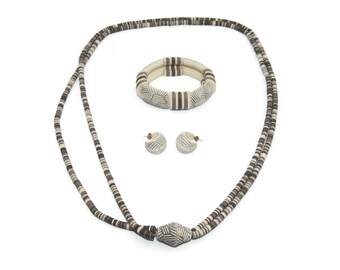 1988 Vintage Avon Sirocco Beaded Resin Necklace with Screw Clasp, Matching Elastic Bracelet and Half Hoop Stud Earrings with Post Backs.