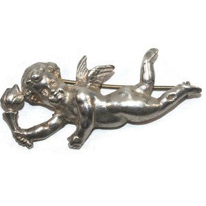 Vintage Sterling Silver Angel Holding Torch Brooch. Marked Sterling.