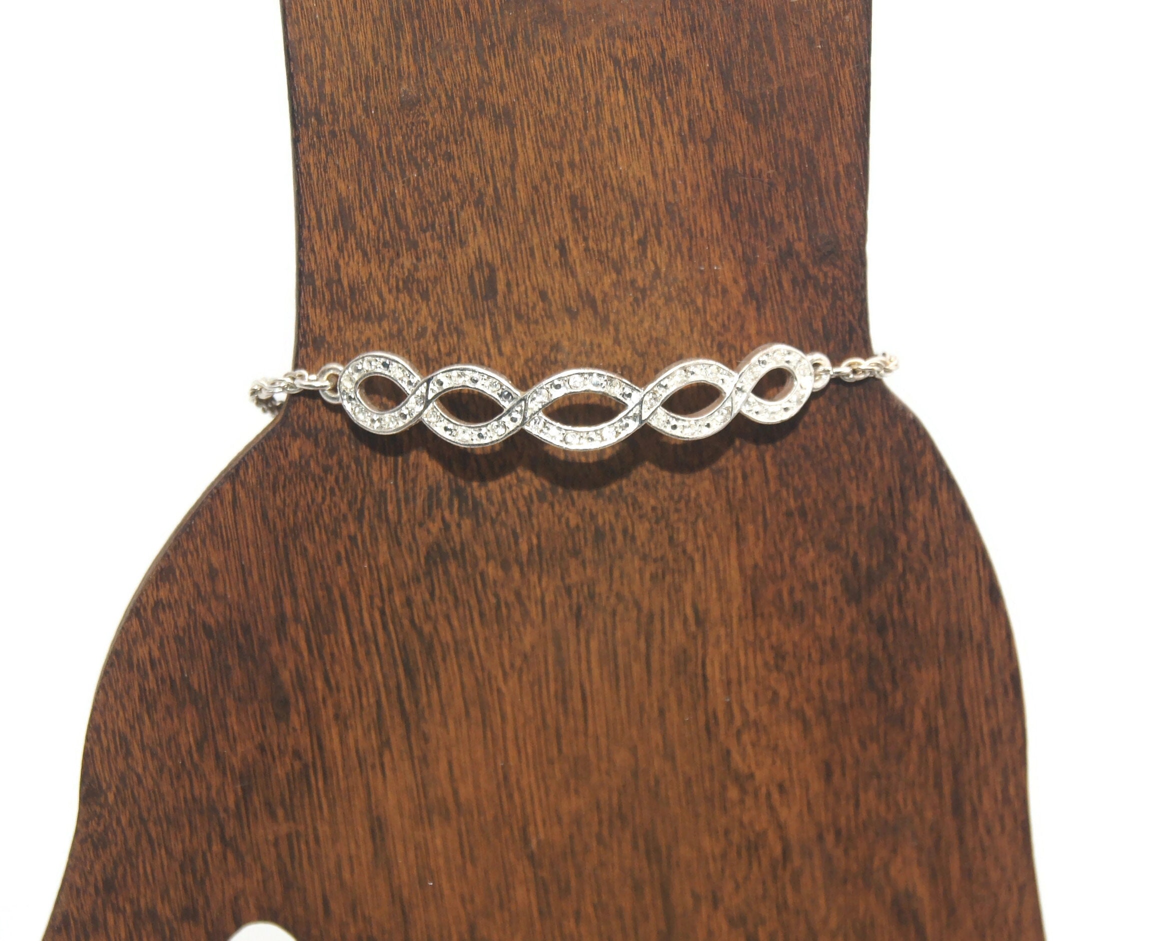 Bracelet à breloques Nina Ricci, rhodium, cristaux Swarovski