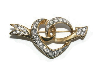 vintage Swarovski Gold Tone et Clear Crystals Heart et Arrow Brooch. Logo de Swarovski Swan.