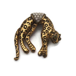 Vintage Florenza Gold Tone, Black Enamel, Clear Rhinestones & Green Rhinestone Eyes with Articulated Tail Cheetah Brooch. Florenza Hallmark.
