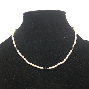 Vintage 18 inch zoetwater parel ketting met 14K goud gevulde lente ring sluiting. Gemarkeerd 14KGF.