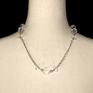 Vintage Silver Tone and Clear Plastic Beads 20 Inch Necklace with Lobster Claw Clasp.