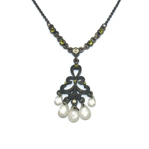 Vintage 1928 Antiqued Gold Tone Chandelier Y-Necklace with Green Rhinestones. It is 16-18 Inches with Lobster Claw Clasp. 1928 Hallmark Tag.