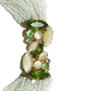 Vintage 24 Strand Pale Green Beaded Necklace with Gold Tone and Green Glass Hook Clasp. image 2