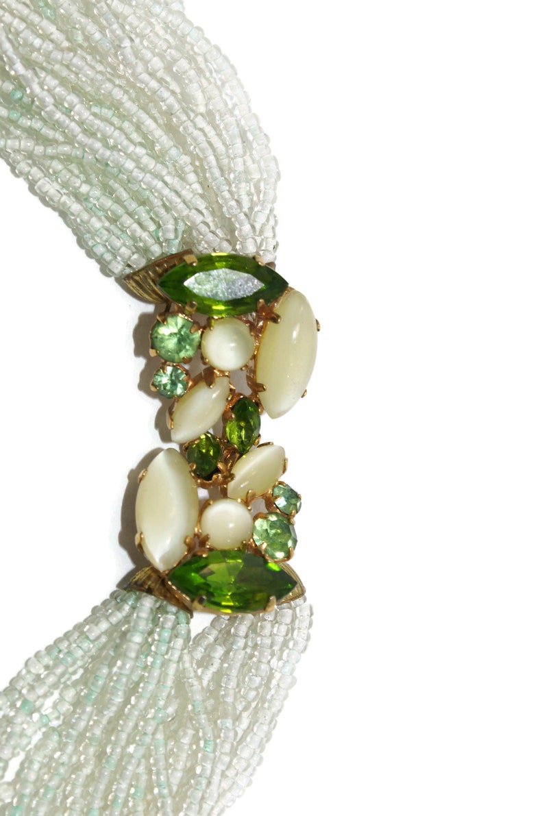 Vintage 24 Strand Pale Green Beaded Necklace with Gold Tone and Green Glass Hook Clasp. image 2