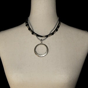 Vintage Premier Designs Silver Tone Circle Pendant on 17 Inch 3 Strand Silver Tone and Black Beaded Chains. PD Hallmark Tag.