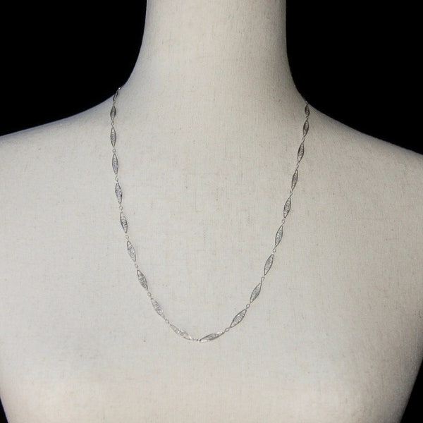 Vintage Trifari Silver Tone 24 Inch Filigree Link Necklace with Spring Ring Clasp. T Hallmark Tag.