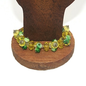 Vintage Silver Tone, Green and Clear Plastic Beaded 6 Inch Elastic Bracelet.