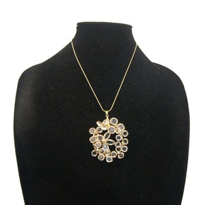 Vintage Gold Tone and Clear Crystals Pendant on 18 Inch Chain with Lobster Claw Clasp.