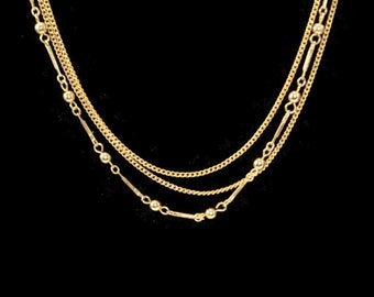 Vintage Gold Tone 31 Inch 3 Strand Chain Necklace with Spring Ring Clasp.