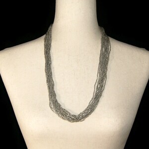 Vintage Coldwater Creek Silver Tone 27 Inch 14 Strand Necklace with Lobster Claw Clasp. Coldwater Creek Hallmark Tag.