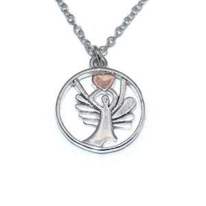 Vintage LACN Silver Tone Angel with Heart Pendant on 18 Inch Silver Plated Chain with Lobster Claw Clasp. LACN Hallmark, Chain Marked 925.