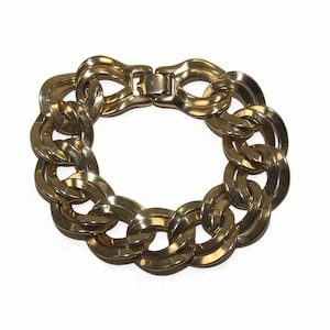 Vintage Monet Gold Tone Double Link 7 1/2 Inch Bracelet with Hinged Clip Clasp. Monet Hallmark.