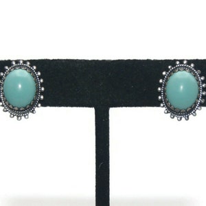 Vintage Silver Tone and Oval Faux Turquoise Cabochon Screw Back Earrings.