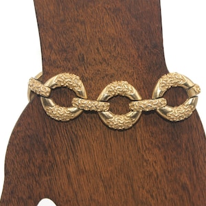Vintage Crown Trifari Gold Tone 7 Inch Link Bracelet with Hinged Clip Clasp and Safety Chain. Crown Trifari Hallmark.