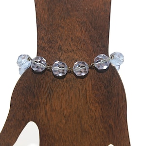 Vintage Blue Glass Beaded 7 1/2 Inch Bracelet with Silver Tone Spring Ring Clasp.
