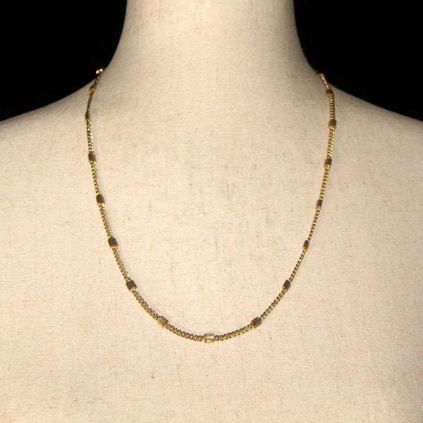 Vintage Les Bernard Gold Tone 24 Inch Link Necklace with a Spring Ring Clasp and Les Bernard Hallmark Tag.