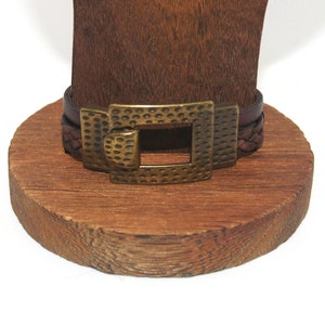 Vintage Gold Tone and Braided Brown Leather 6 1/2 Inch Buckle Bracelet with Hook Clasp.