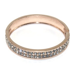 Vintage Gold Tone and Rhinestones 7 Inch Spring Hinged Cuff Bracelet.