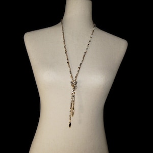 Long Vintage Gold Tone, with Silver Tone, Gold Tone and White Beads and Clear Rhinestones Lariat Necklace.