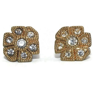 Vintage Avon Gold Tone, Clear Rhinestones Floral Stud Oorbellen met Post Backs voor doorboorde oren. Avon-keurmerk.