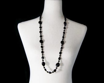Vintage Black Plastic and Gold Tone Beaded 34 Inch Necklace.