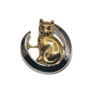 Vintage Gold and Silver Tone Cat with Blue Rhinestone Eyes Brooch.