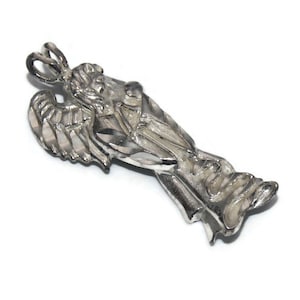 Vintage Sterling Silver Guardian Angel Pendant. Marked 925.
