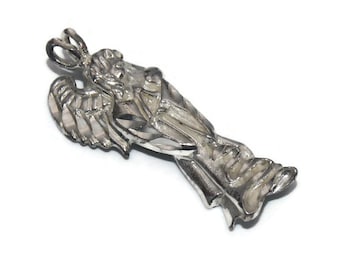 Vintage Sterling Silver Guardian Angel Pendant. Marked 925.