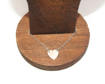 Delicate Vintage Silver Tone 9 to 10 1/2 Inch Adjustable Anklet with a Stationary Heart Charm. Hearts and Lobster Claw Clasp.
