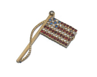 Vintage Gold Tone American Flag Brooch with Red, Clear and Blue Rhinestones.