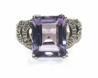 Vintage Sterling Silver with Emerald Cut Amethyst Size 7 1/2 Ring. Marked 925 RT.