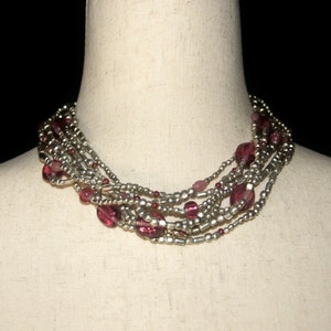 Vintage Coldwater Creek Silver Tone and Pink Plastic Beads 9 Strand 18 Inch Necklace with Lobster Claw Clasp. Coldwater Creek Hallmark Tag.
