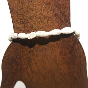 Vintage Gold Tone 8 Inch Shell Bracelet with Toggle Clasp.