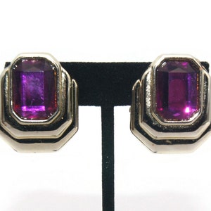 Vintage Gold Tone and Faceted Purple Plastic Clip on Earrings.