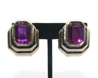 Vintage Gold Tone and Faceted Purple Plastic Clip on Earrings.