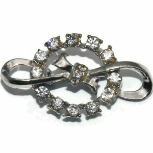 Vintage Silver Tone Rhodium Plated and Clear Rhinestones Circle and Bow Brooch.