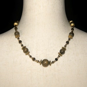 Vintage Gold Tone with Wood, Glass and Plastic Beads 19 Inch Necklace with Toggle Clasp.