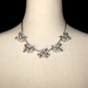 Vintage Silver Tone, Faux Pearls and Clear Rhinestones 17 to 20 Inch Adjustable Bib Necklace with Lobster Claw Clasp.