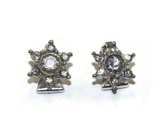 Vintage Silver Tone and Rhinestones Star Clip on Earrings with Floral Design Engraved on Backs.