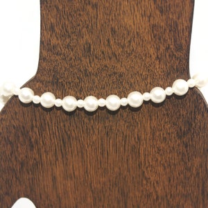 Vintage Faux Pearl 7 Inch Bracelet with Gold Tone Spring Ring Clasp. Marked Korea.